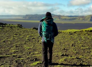 4 Things to Know Before a Solo Backpacking Adventure Backpacker hiking in nature