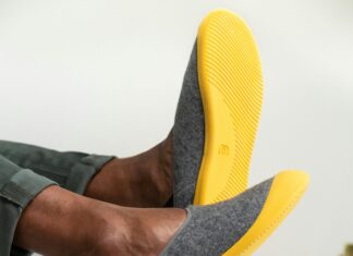 Best Slippers To Take On Your Next Trip Man's feet with slippers