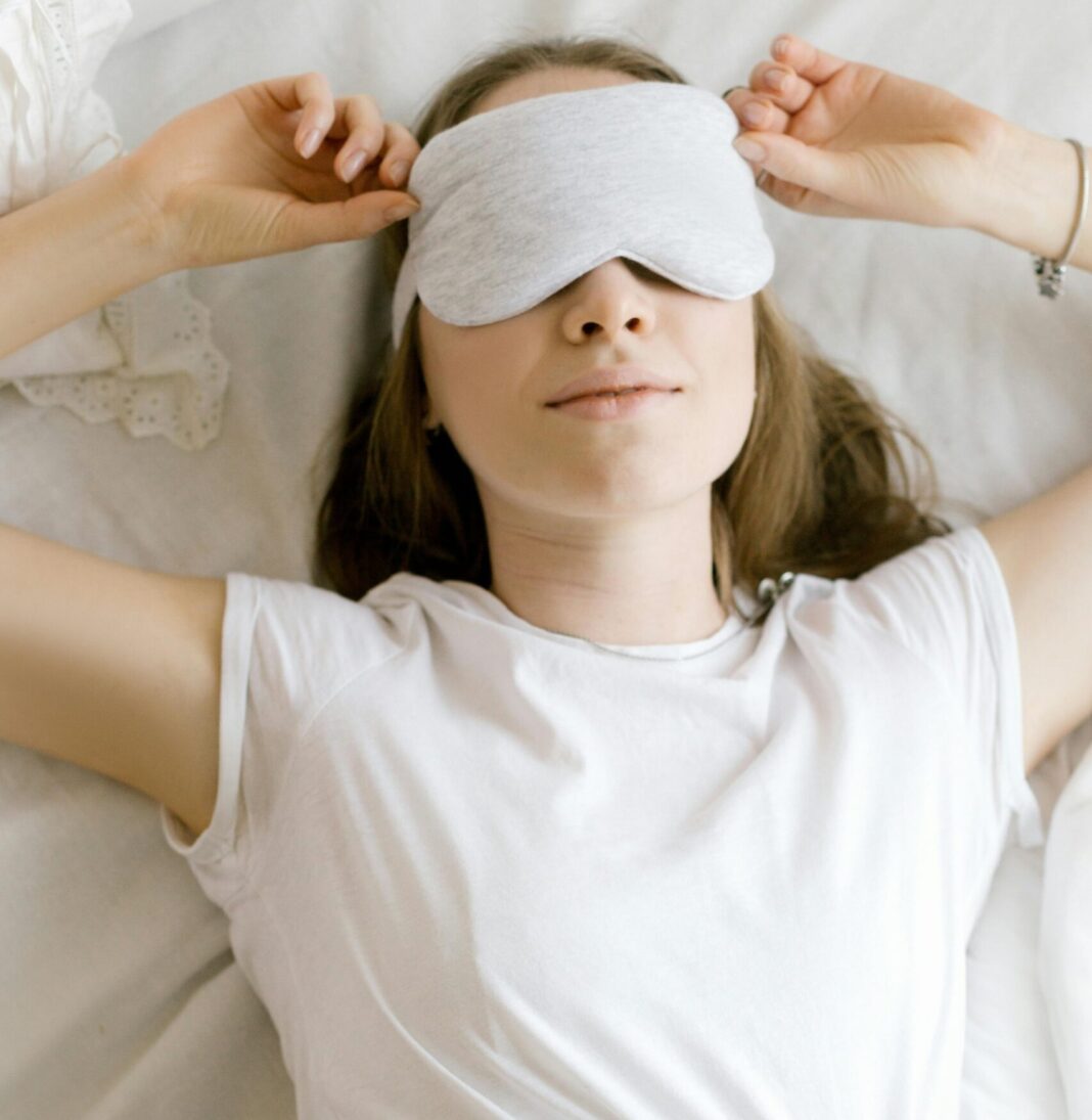 Woman wearing a sleeping mask