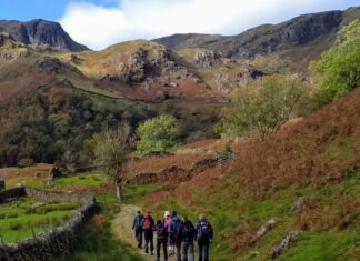 Here’s Why the Lake District, UK is Perfect for Wild Camping Group of hikers in Lake District, Keswick, UK