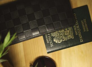How to Store Your Travel Documents During Your Vacation Passport wallet and accessories on a table