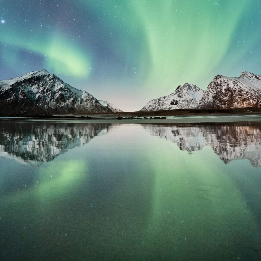 northern lights unfold in the sky in Norway