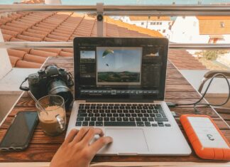 Accessories That You Should Get For Working Remote Remote worker on a roof in Tisno, Croatia