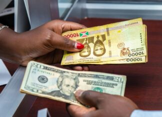 Everything You Need To Know About Shopping Tax-Free People Exchanging Money in Cantor