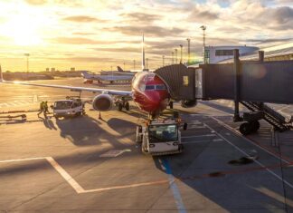 Frequent Flyer Tips to Make Traveling Easy Red Airplane in Kastrup, Denmark