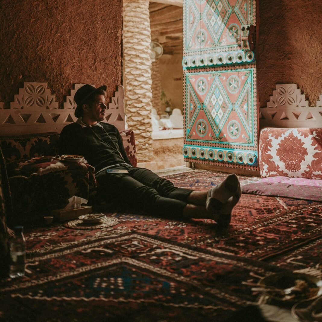 Man lounging in a home in Riyadh, Saudi Arabia