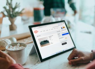 Best Tablets For Travel Man using a tablet computer