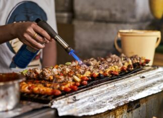 Food Tour of Bangkok’s Street Markets Street food barbecue at a night market in Bangkok