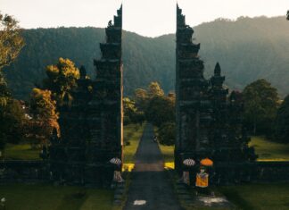 Best Beaches in Bali, Indonesia Back View of a Woman Walking Towards the Famous Bali Handara Gate