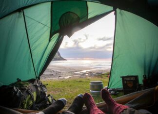 These Campsites in the UK Have the Best Views Two People Lying Inside Tent
