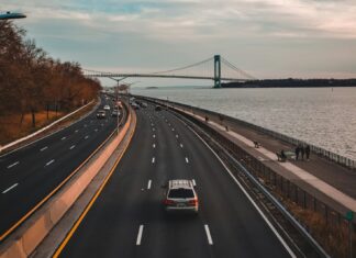 Best Places to Take a Road Trip in the U.S. Car driving on a multilane road