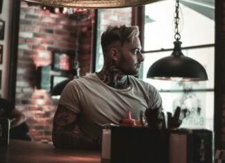 3 Ways to Top Up Your Protein Intake on Vacation Man standing at a food counter