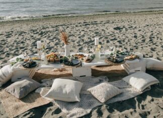 These Holiday Destinations are Amazing for Fresh Seafood! A Table with Food on the Beach