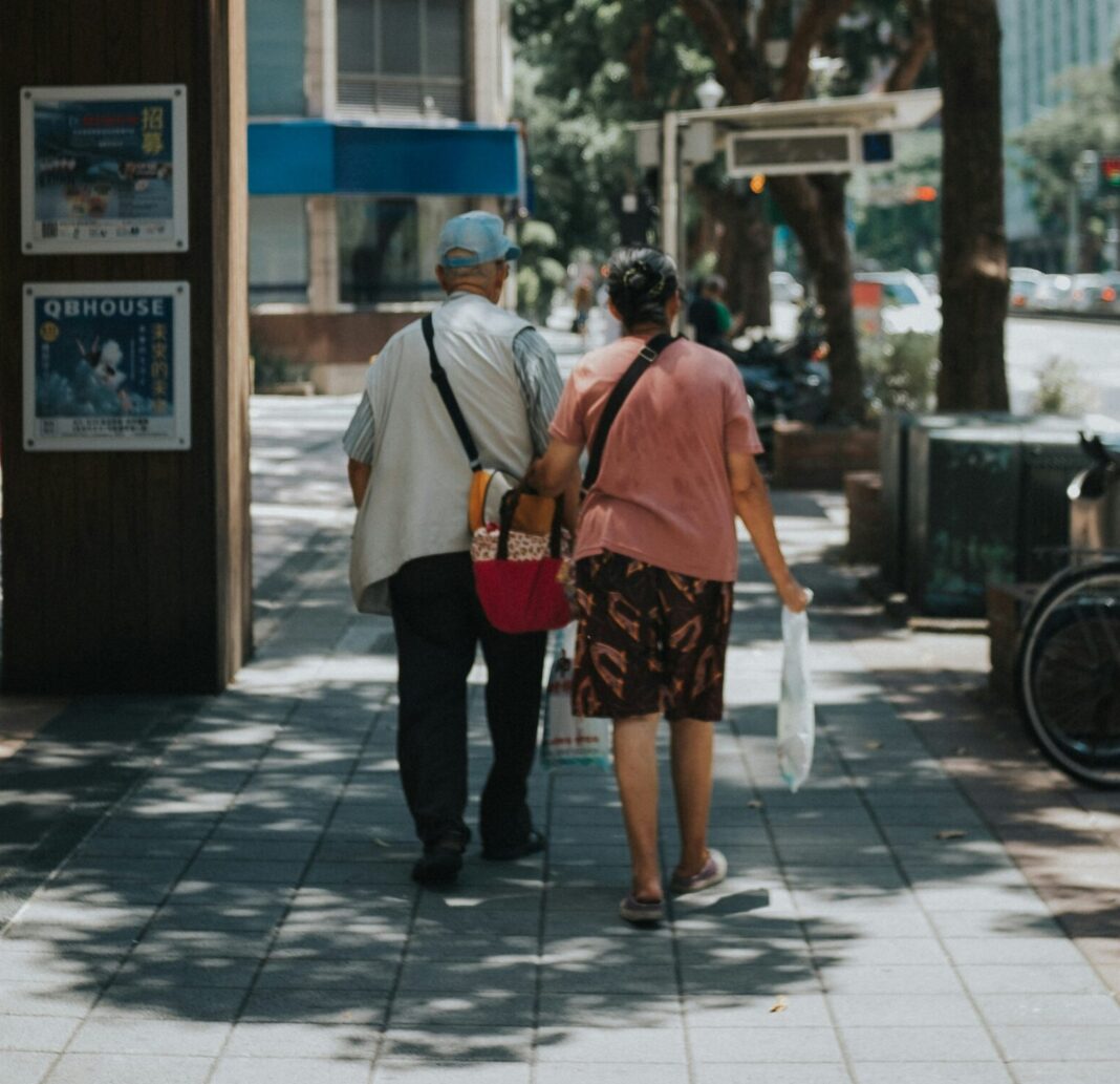 Elderly couple walking