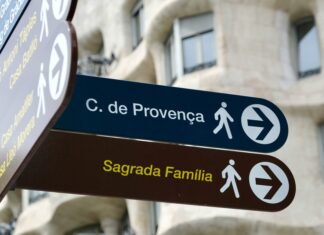3 Tips For Saving Money When Visiting Barcelona’s Sagrada Familia Sagrada Familia sign, Barcelona, Spain